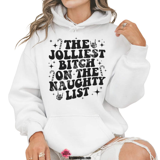 Christmas Sweaters by KrcilDesigns.com | Graphic design on a white hoodie, featuring an all back design, bold black capital wavy retro letters, text that reads: "The Jolliest Bitch On The Naughty List" surround by diamond stars, candy canes, and a rock-on skeleton hand.