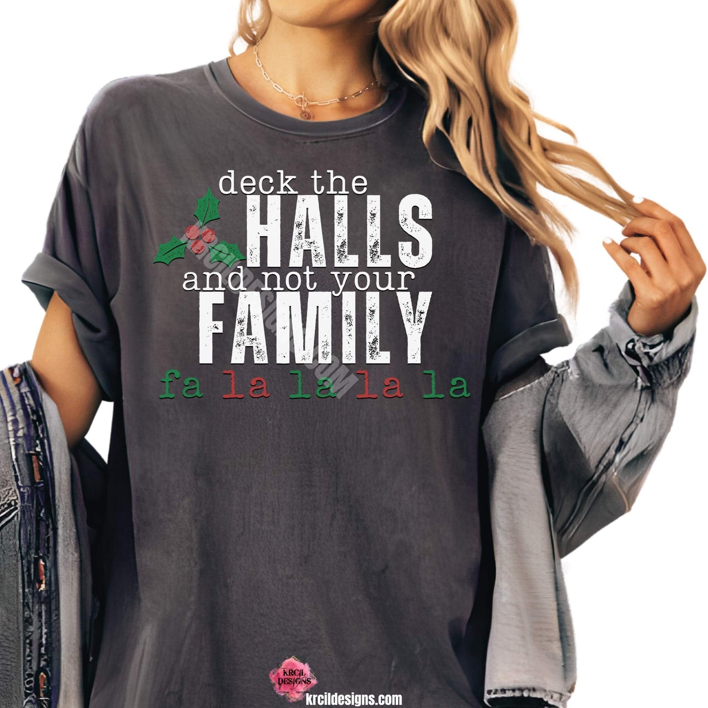 Vintage Distressed Deck The Halls and Not Your Family Christmas Tee by Krcil Designs | Make a fashion statement with our graphic tees t-shirts! Our buttery soft cozy tees will become your new weekend bestie! Dress to impress with clothes that have laugh-out-loud jokes—Introducing our "deck the HALLS and not your FAMILY falala" Funny Christmas Shirt. This holiday season, celebrate in style with Christmas t-shirts for family—perfect for family photos! Shop Christmas Tees at KrcilDesigns.com