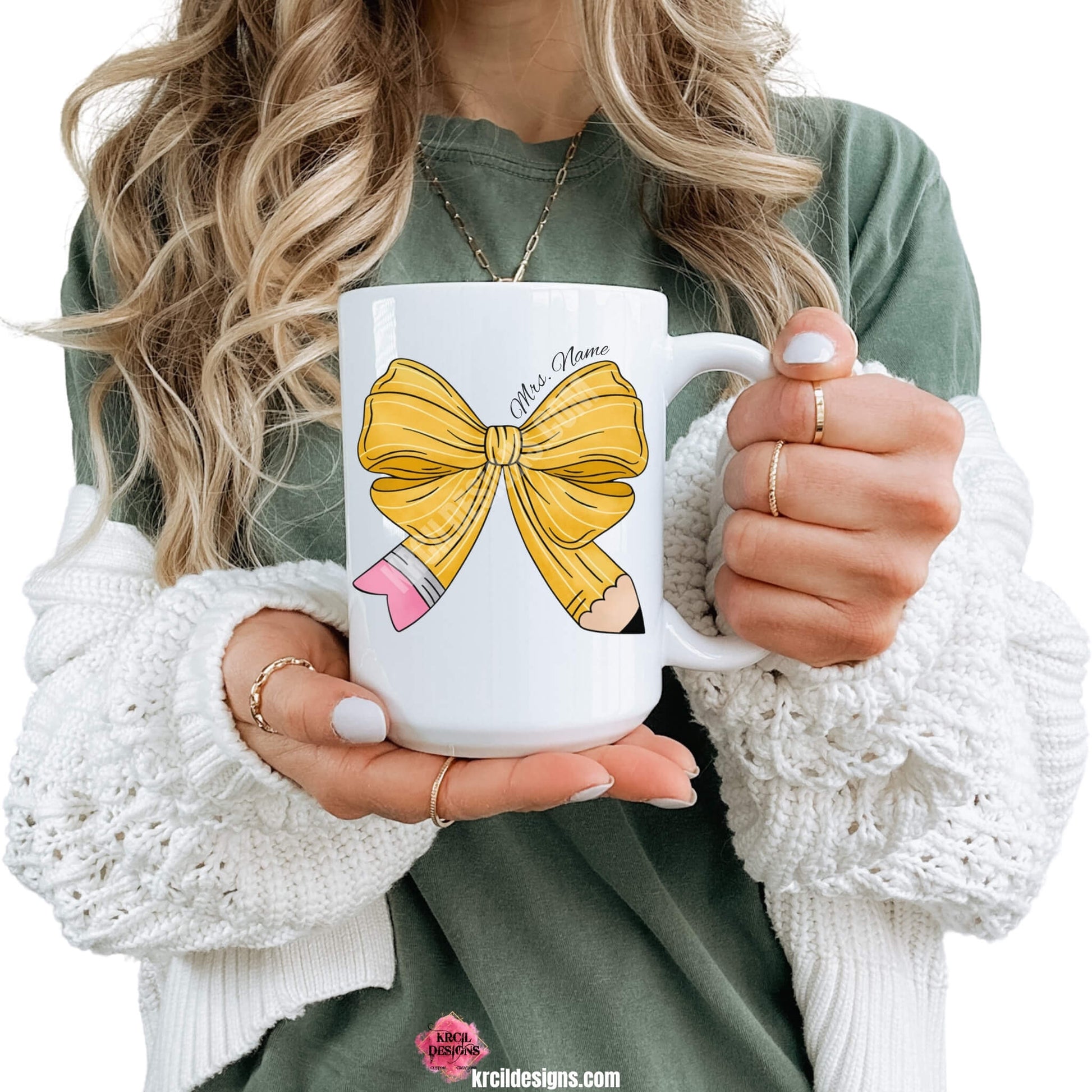 Coquette Bow Coffee Mugs by KrcilDesigns.com | Graphic design on a white ceramic mug, a coquette bow in a pencil pattern design, features your name, curved around top of bow in a black script font that reads: "Mrs. Name" for a teacher mug.