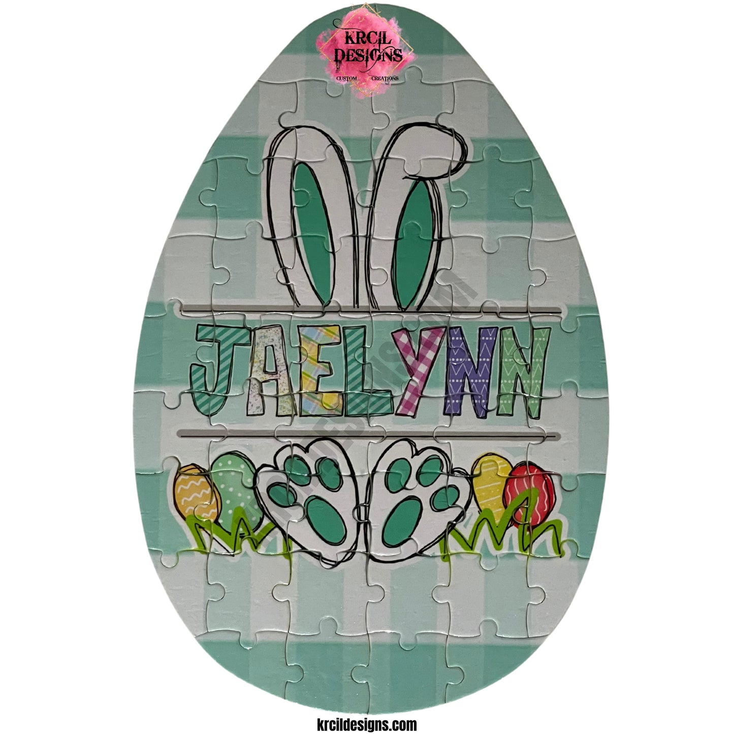 Easter Bunny with Name Personalized Easter Egg Shaped Puzzle ~ Pink, Purple, Green Plaid Background ~ CUSTOMIZE ME ~ YOU PICK ANY DESIGN, IMAGE, OR TEXT & WE MAKE IT! ~ Thank you for stopping by KRCIL DESIGNS! We hope you enjoy your stay! Happy Shopping! ~ KRCIL DESIGNS specializes in customization and personalization of apparel and drinkware items, creating unique one-of-a-kind personalized custom gifts. For your personal custom order visit us at krcildesigns.com