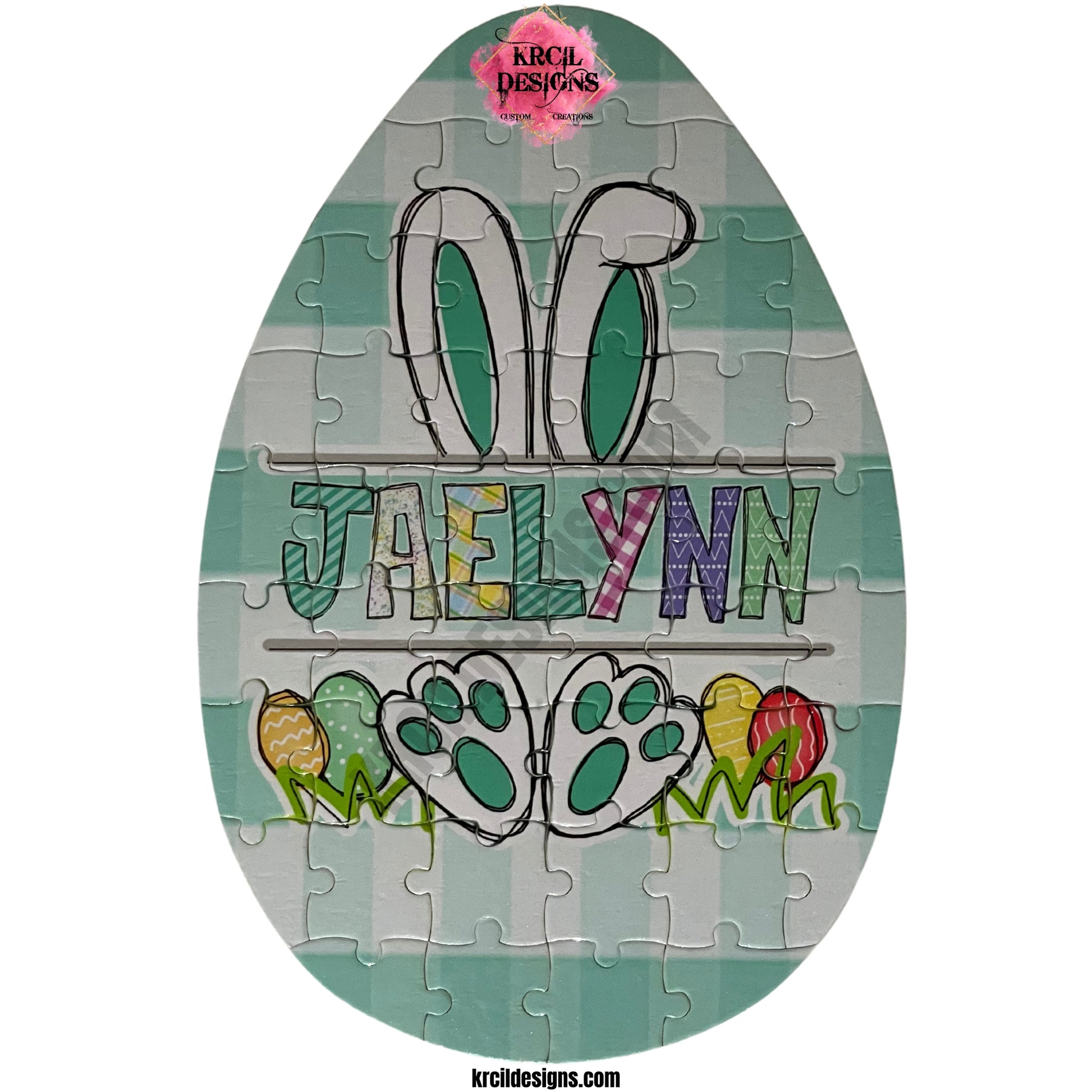 Easter Bunny with Name Personalized Easter Egg Shaped Puzzle ~ Pink, Purple, Green Plaid Background ~ CUSTOMIZE ME ~ YOU PICK ANY DESIGN, IMAGE, OR TEXT & WE MAKE IT! ~ Thank you for stopping by KRCIL DESIGNS! We hope you enjoy your stay! Happy Shopping! ~ KRCIL DESIGNS specializes in customization and personalization of apparel and drinkware items, creating unique one-of-a-kind personalized custom gifts. For your personal custom order visit us at krcildesigns.com