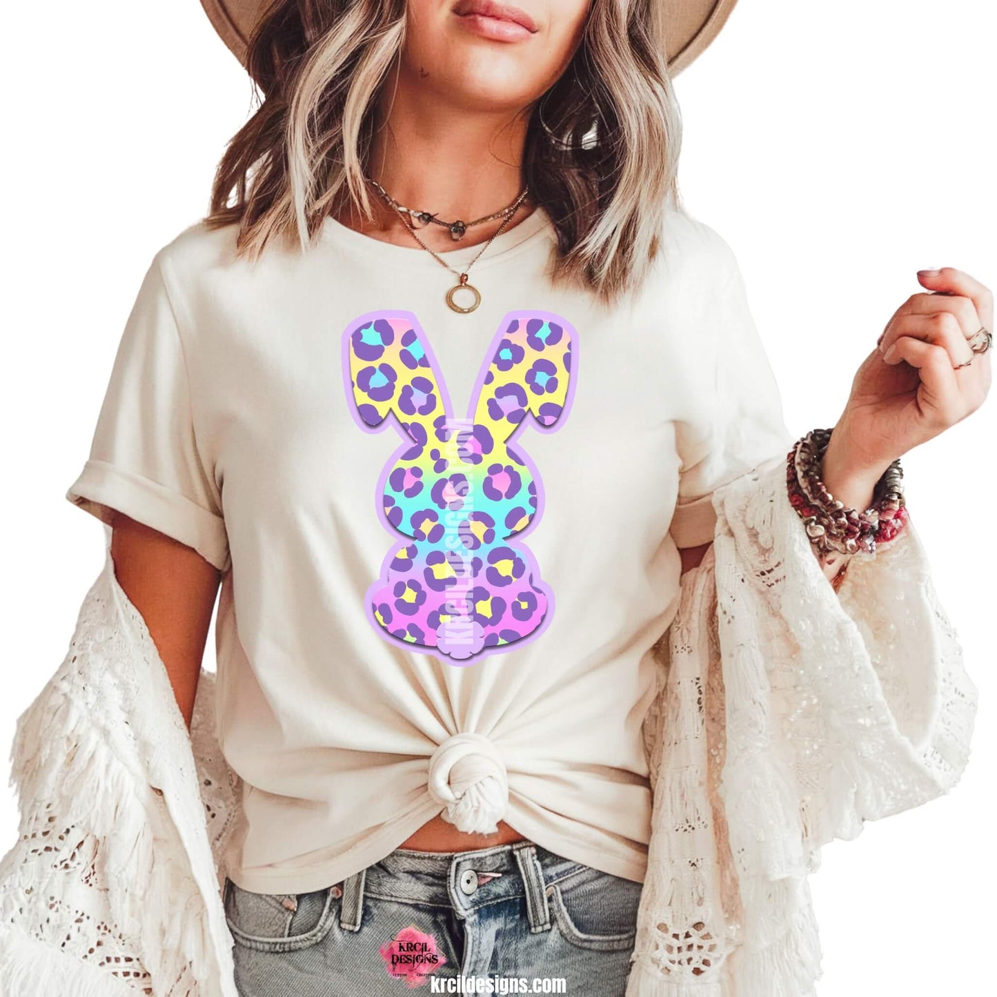 Pastel Cheetah Print Easter Bunny T-Shirt by Krcil Designs | Make a fashion statement with our graphic tees t-shirts! Our buttery soft cozy tees will become your new weekend bestie! Get ready to hop into fun with our fun Easter shirt! Our graphic design, showcases a pastel cheetah print bunny and vibrant splashes of Easter colors. This Easter, celebrate in style with matching family shirts—perfect for family photos! Shop Easter Shirts at KrcilDesigns.com