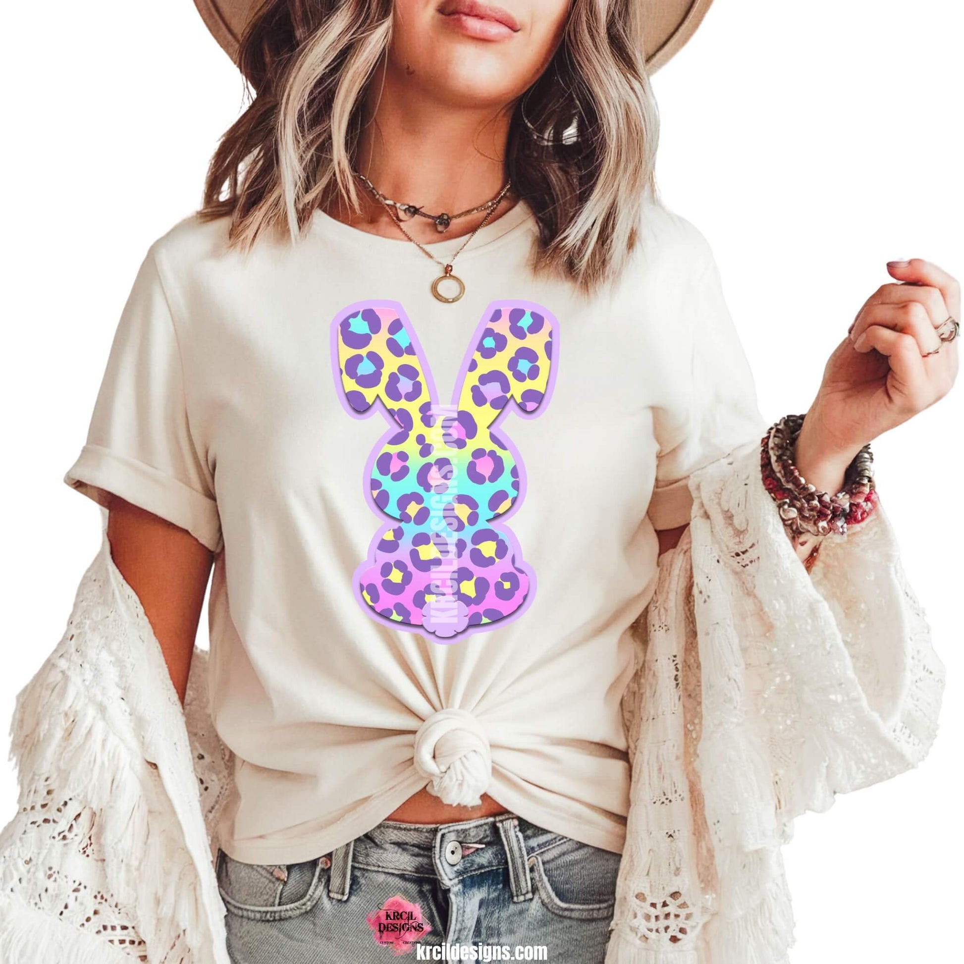 Pastel Cheetah Print Easter Bunny T-Shirt by Krcil Designs | Make a fashion statement with our graphic tees t-shirts! Our buttery soft cozy tees will become your new weekend bestie! Get ready to hop into fun with our fun Easter shirt! Our graphic design, showcases a pastel cheetah print bunny and vibrant splashes of Easter colors. This Easter, celebrate in style with matching family shirts—perfect for family photos! Shop Easter Shirts at KrcilDesigns.com
