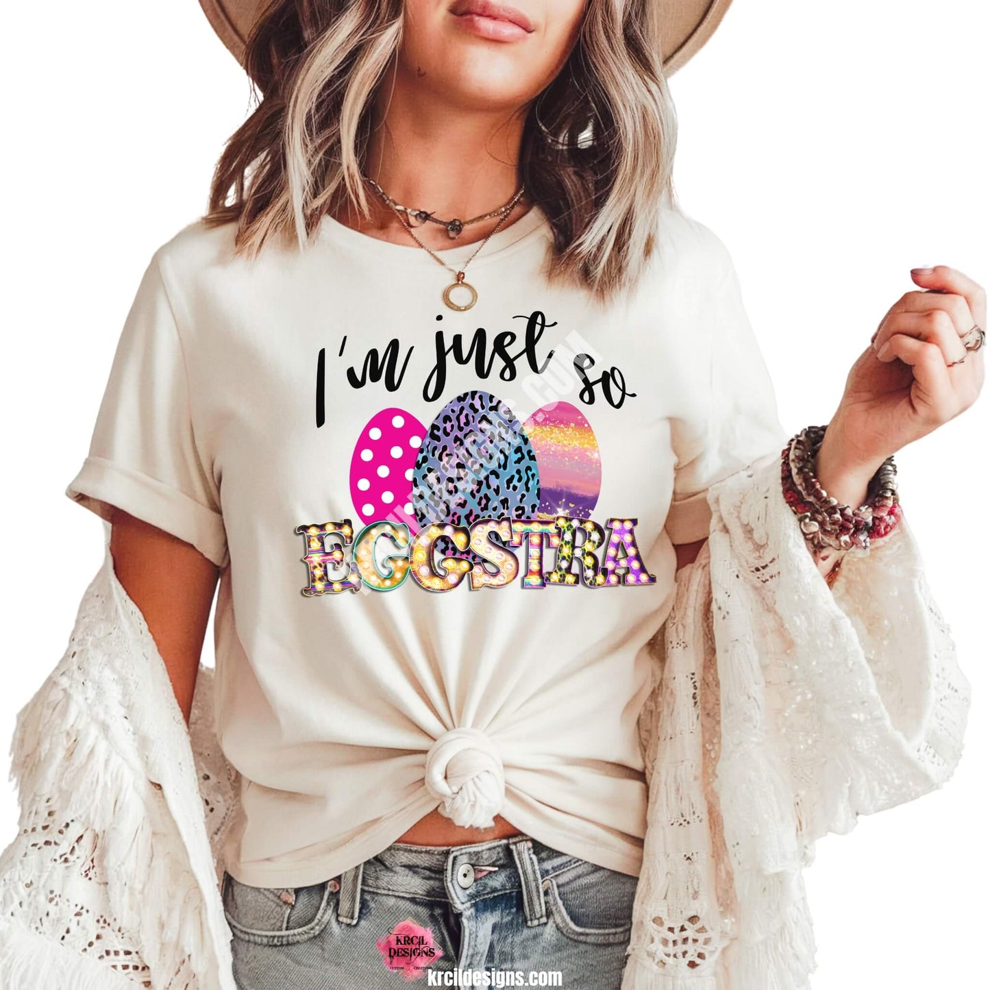 I'm just so EGGSTRA Easter T-Shirt by Krcil Designs | Make a fashion statement with our graphic tees t-shirts! Our buttery soft cozy tees will become your new weekend bestie! Get ready to hop into fun and show off your vibrant personality with our "I'm just so EGGSTRA" Easter shirt! Our graphic design, showcasing vibrant, bright, colorful Easter eggs and a fun, playful message. This Easter, celebrate in style with matching family shirts—perfect for family photos! Shop Easter Shirts at KrcilDesigns.com