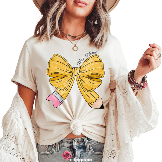 Coquette Bow Shirts by KrcilDesigns.com | Graphic design on a white t-shirt, a coquette bow in a pencil pattern design, features your name, curved around top of bow in a black script font that reads: "Mrs. Name" for a teacher shirt.