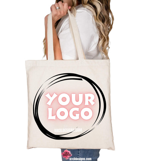 Your Brand, Your Logo Tote | Business Logo Tote Bag by Krcil Designs | Design Your Own with Krcil Designs! | Spotlight Your Brand! Introducing our Your Brand, Your Logo – where style meets business. These business promotional products are tailor-made for boosting brand recognition, making them perfect for events, customers, teams, employees, or simply making your brand known, and are designed for showcasing your identity, your brand, your business logo, your way! KrcilDesigns.com