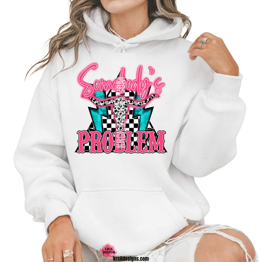 Sassy Sweatshirts and Hoodies by KrcilDesigns.com | Graphic design on a white hoodie, featuring hot pink text that reads: "Somebody's PROBLEM" with "Somebody's" as a handwritten font at top and "PROBLEM" in all caps block-letter font at bottom, with cowhide bullhorns at its center, black and white checkered triangle background, and turquoise lighting bolts.
