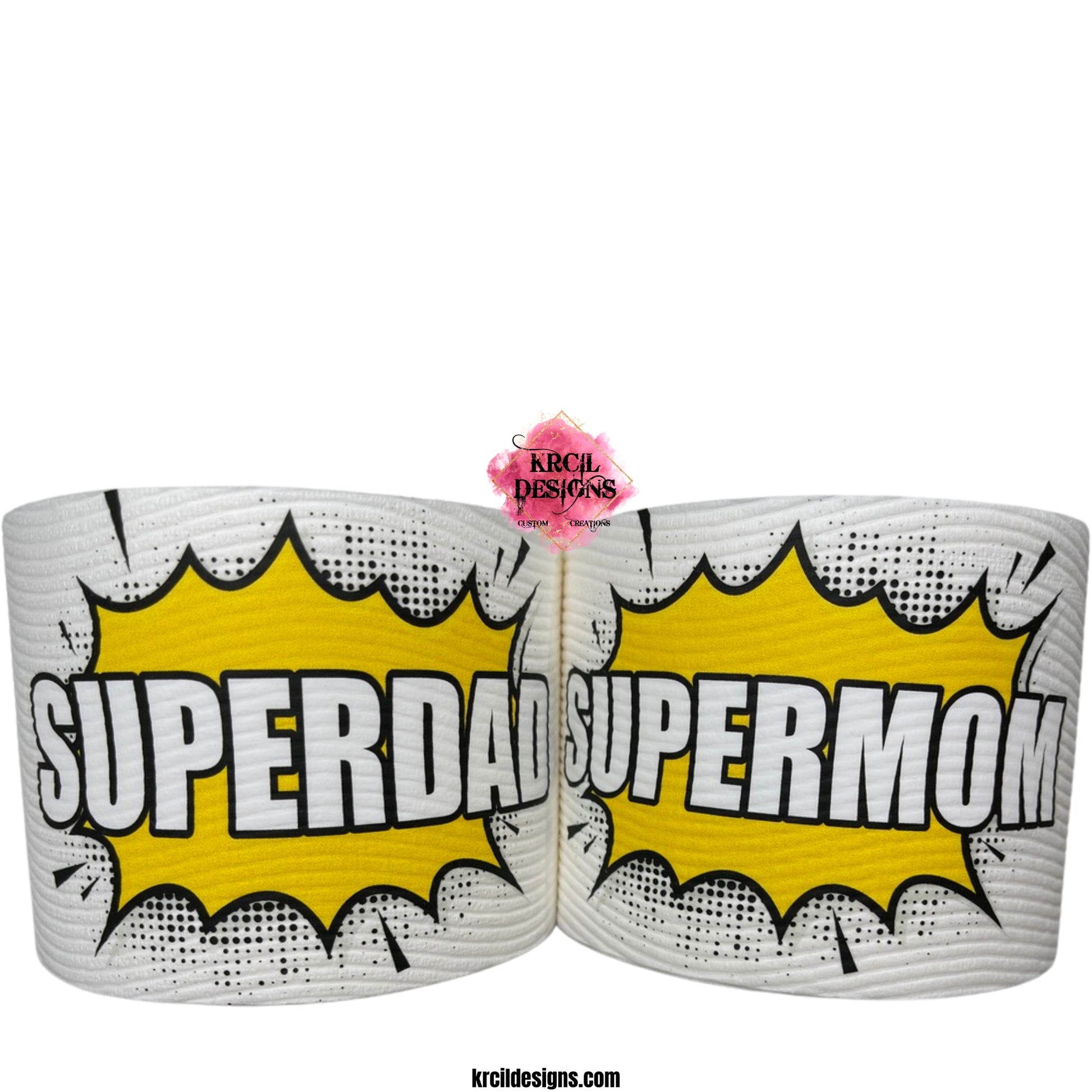 Superhero Toilet Paper by KrcilDesigns.com | Graphic design on white toilet paper roll, featuring a bold comic book-style graphic in center, showcases a bright yellow explosion shape with sharp black jagged edges and a dotted halftone pattern around the perimeter, in the middle of the explosion, in all caps text that reads: "SUPERDAD" or "SUPERMOM" with thick, bold white letters outlined in black. The design captures an energetic, superhero vibe, celebrating dads and moms as powerful and unstoppable.