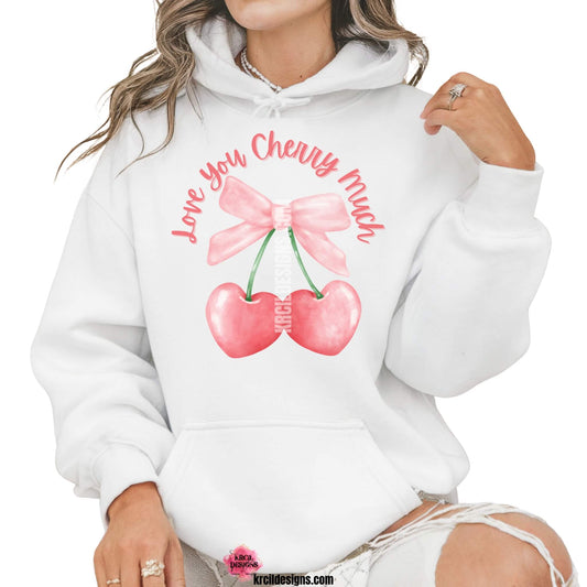 Coquette Bow Shirts by KrcilDesigns.com | Graphic design on a white hoodie, pink script font text that reads: "Love You Cherry Much" with a watercolor pink coquette bow and two pink cherry hearts dangling from bow.