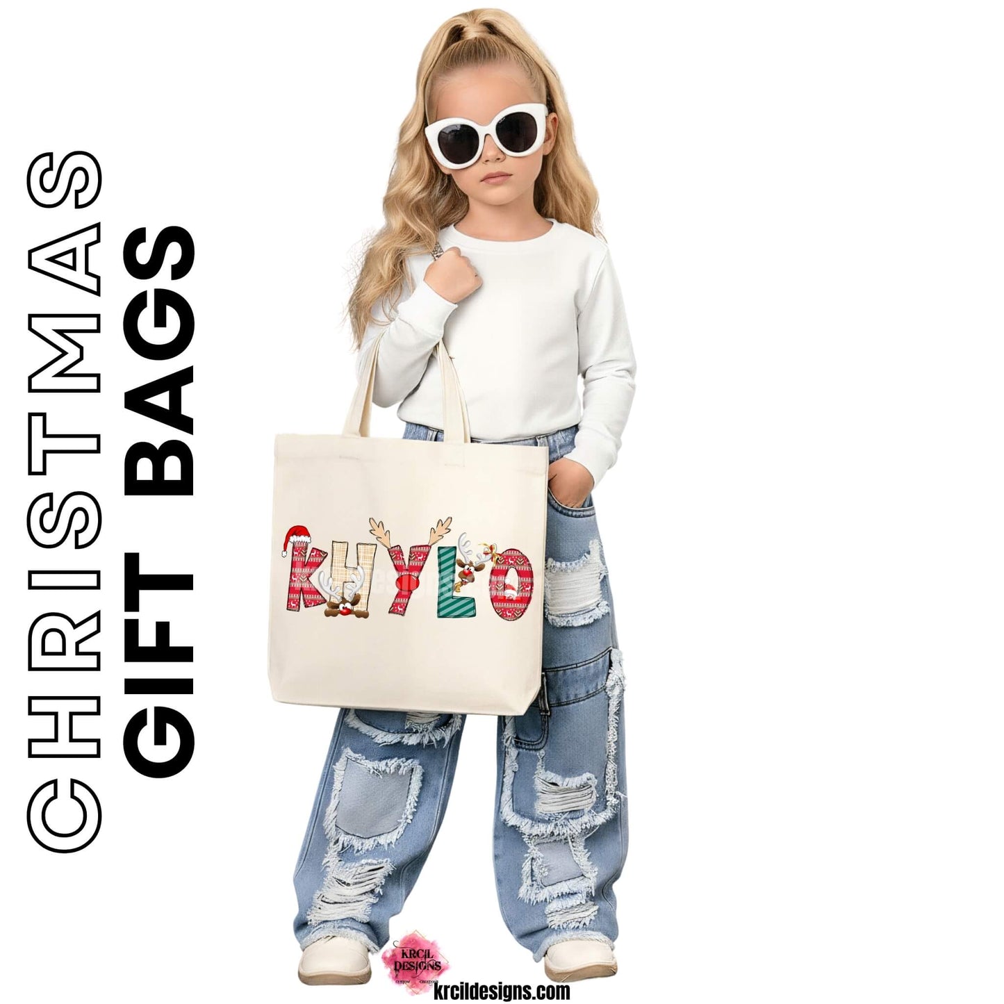 Christmas Personalized Tote Bags by KrcilDesigns.com | Graphic Design on a canvas tote bag, features your name, in name style option: "Christmas" where the designs of the letters are different festive Christmas patterns. The letters don a Santa Hat, Rudolph's Red Nose, and Reindeer Antlers. Santa and his Reindeer are playing Peek-a-Boo and are peeking out of letters.