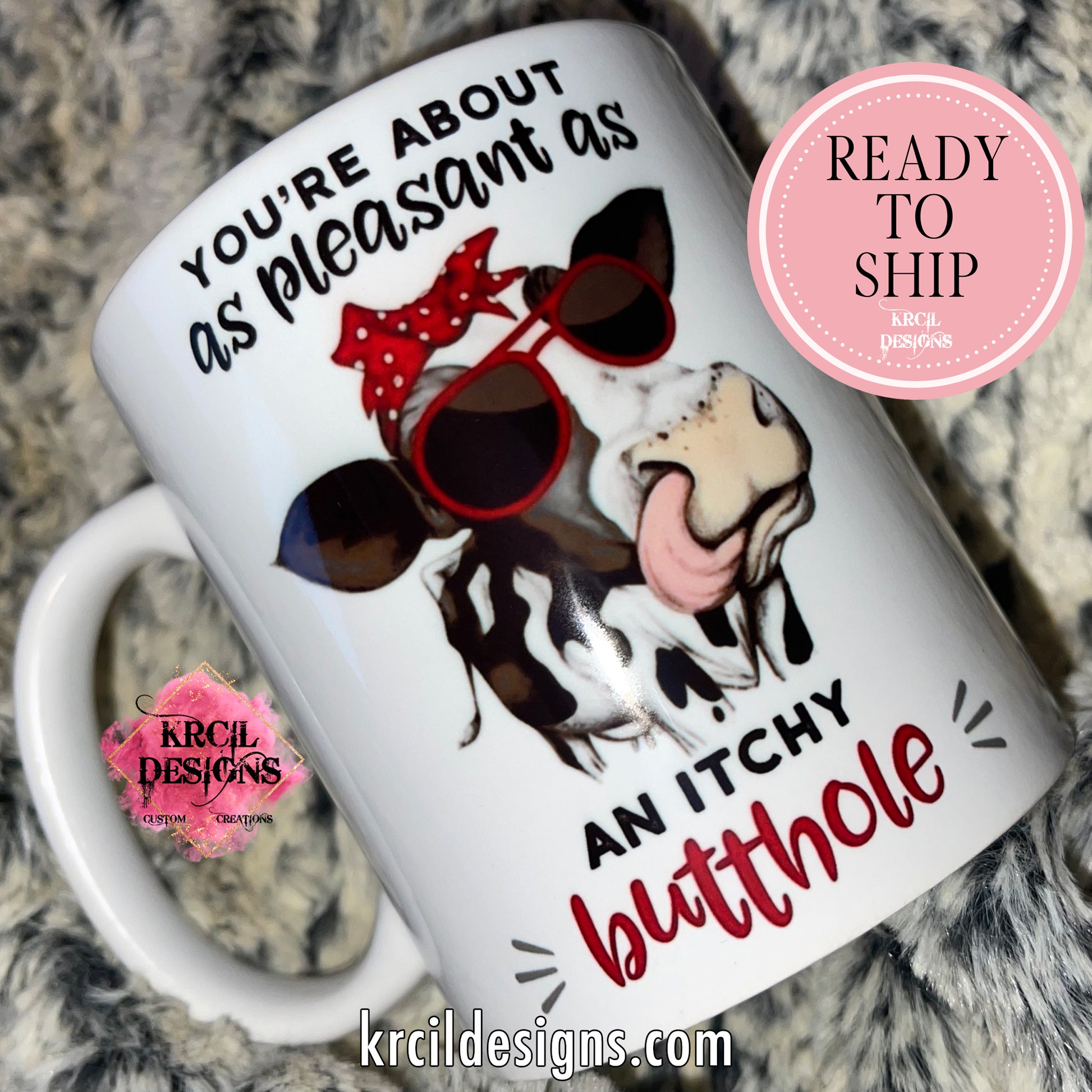 https://krcildesigns.com/cdn/shop/files/11oz-WHITE-COFFEE-CUP-COW-YOURE-ABOUT-AS-PLEASANT-AS-AN-ITCHY-BUTTHOLE-RTS-krcildesigns.com.jpg?v=1699806071&width=1946
