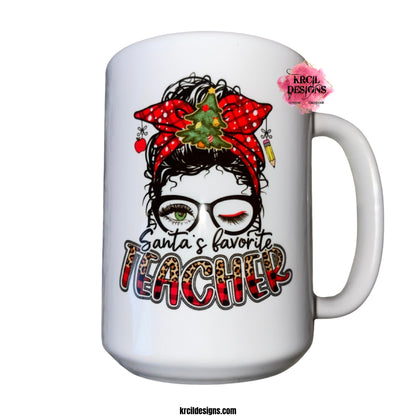 Santa's Favorite Teacher Christmas Coffee Cup | Personalized Coffee Mug by Krcil Designs | Meet Santa's Favorite Teacher! She's all dressed up with a curly hair bun, twinkling Christmas lights, festive ornaments, and a Christmas bow. Plus, she adds an extra sparkle with her stylish glasses. She's the embodiment of holiday cheer, spreading warmth and knowledge throughout the season! KrcilDesigns.com