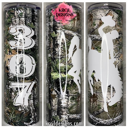 Camouflage 307 Wyoming Cowboys Tumbler by Krcil Designs | Show off your Wyoming pride, this is your ticket to ride with the iconic Wyoming Cowboys bucking bronco rider on a camouflage backdrop. Unleash the cowboy/cowgirl in you with this one-of-a-kind custom tumbler, featuring the untamed spirit of the bucking horse rider. Add name, your favorite Wyoming quote, make it a one-of-a-kind personalized tumbler. This coffee tumbler is what the Cowboy State is all about! Shop Wyoming Gifts at KrcilDesigns.com