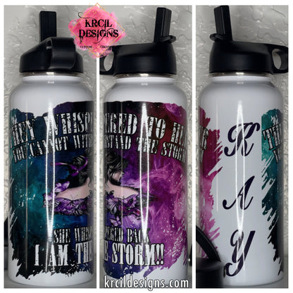 Butterfly Girl I Am The Storm Quote Water Bottle by Krcil Designs | Hydrate with courage and strength with our Quote Water Bottle! This custom water bottle features a colorful backdrop, a beautiful butterfly girl, and the I Am The Storm Quote. This hydro water bottle is the ultimate motivational gift for those who love the I Am The Storm Quote! Add a personal touch, add name, your favorite quote, for a one-of-a-kind personalized water bottle. Shop Inspirational Gifts at KrcilDesigns.com