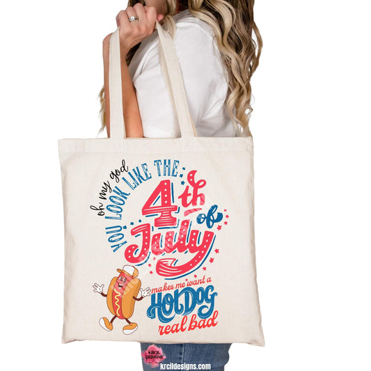 4th of July Funny Tote Bags by KrcilDesigns.com | Graphic design on a canvas tote bag, featuring a dancing smiling cartoon hot dog wearing sneakers, a baseball cap, and hands are waving. Colorful text in red, white, and blue colors, in a variety of fonts, text that reads: "Oh My God You Look Like The 4th of July Makes Me Want A Hot Dog Real Bad" Fun, festive, and perfect for Independence Day celebrations!