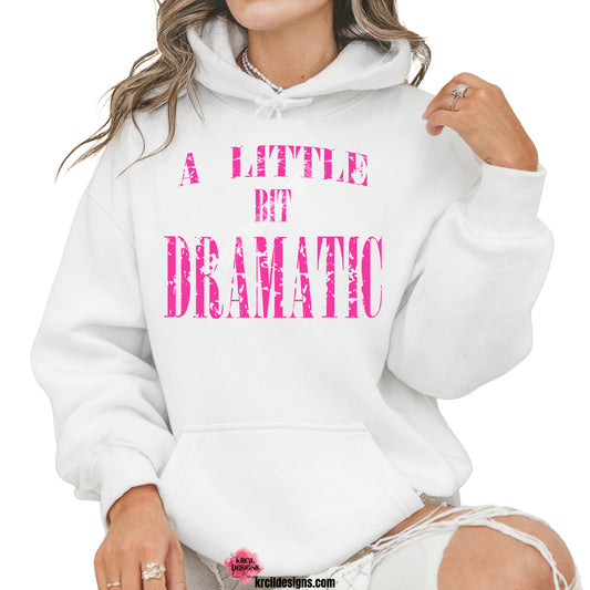 A Little Bit Dramatic Mean Girls Sweatshirt by Krcil Designs | Make a fashion statement with our hoodies and sweatshirts! Our soft cozy sweatshirts will become your new weekend bestie! Introducing our Mean Girls sweatshirt! Make Regina George jealous with our Mean Girls hoodie — because every queen needs a comfy, stylish way to express her flair! Featuring the iconic quote: "A LITTLE BIT DRAMATIC" in bold hot pink distressed letters. Shop Hoodies and Sweatshirts at KrcilDesigns.com