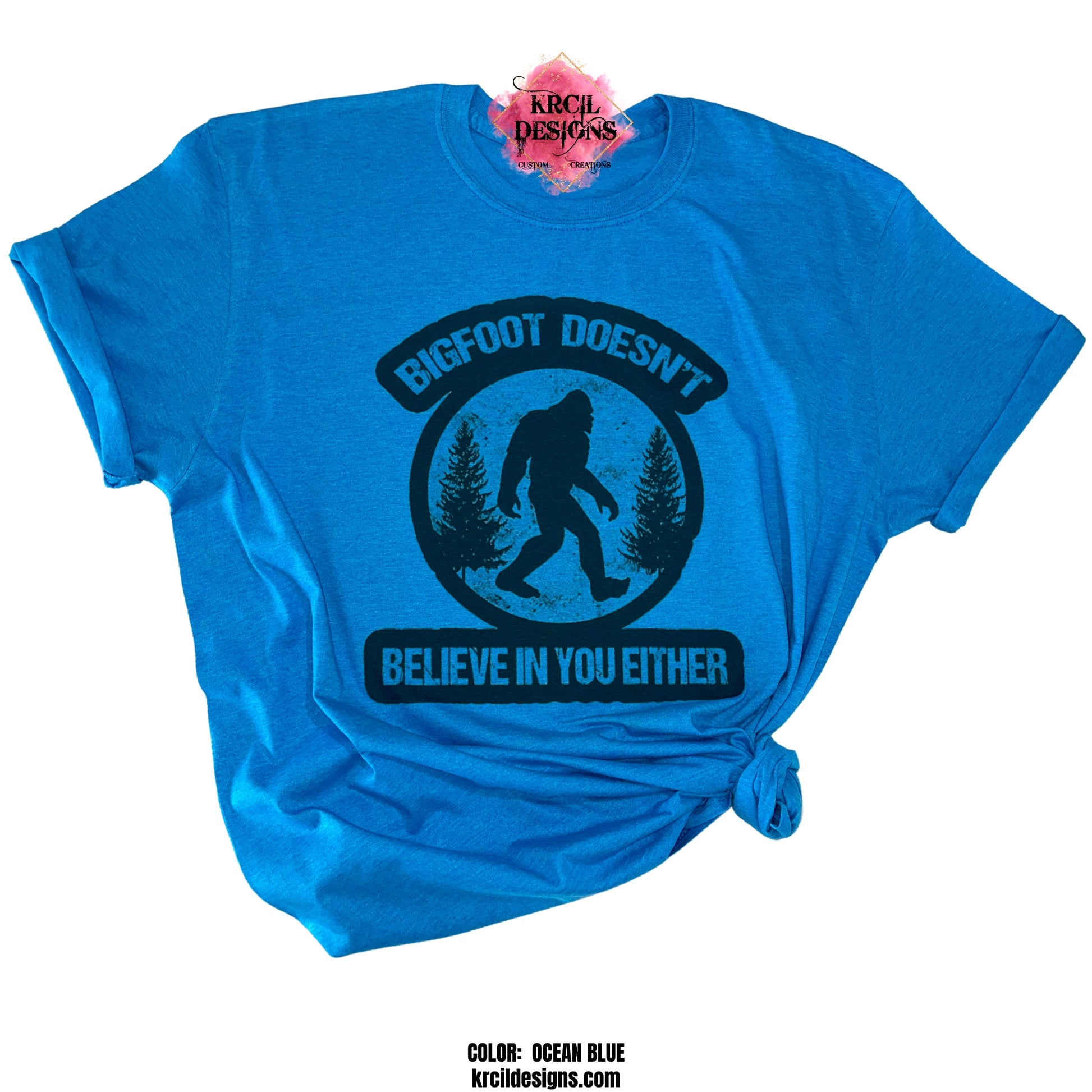 OCEAN BLUE | Show off your sense of humor with our Sasquatch T-Shirt "Bigfoot Doesn't Believe In You Either" Bigfoot T-Shirt by Krcil Designs! Featuring Bigfoot! The Bigfoot Tee that's a conversation starter at the Bigfoot Festival or on Bigfoot Day. Don't miss the fun — grab your Sasquatch Tee before it disappears into the woods! Give the gifts for Bigfoot lovers that make them roar with laughter! Keep the Bigfoot Legend Alive! Sasquatch: The Legend of Bigfoot! Shop Bigfoot Gifts at KrcilDesigns.com