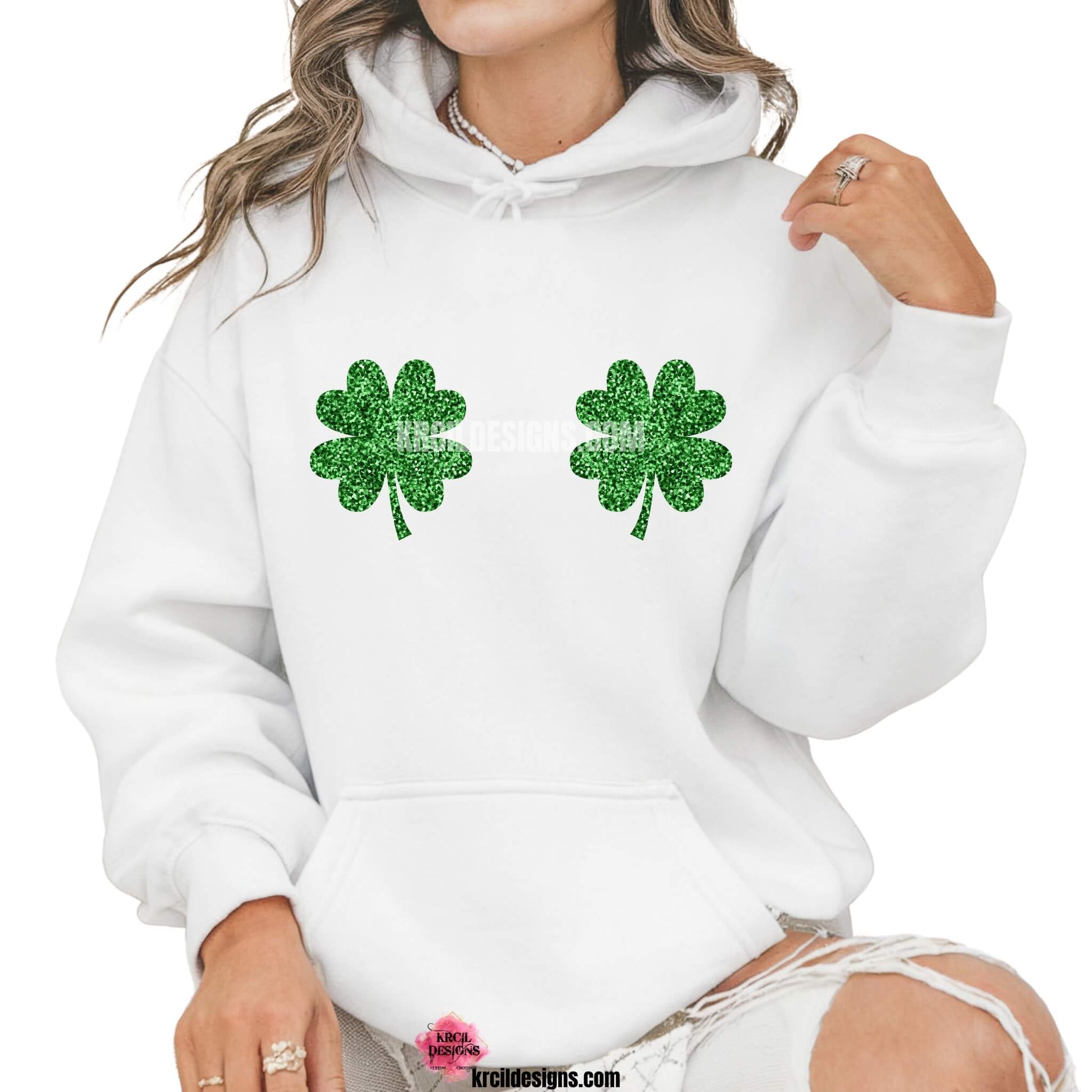 Shamrock Boobs St. Patrick's Day Funny Shirts by KrcilDesigns.com | Graphic design on a white hoodie, speaking for itself, two green shamrocks are strategically placed—because nothing says luck like a little mischief and shamrocks over your boobs!