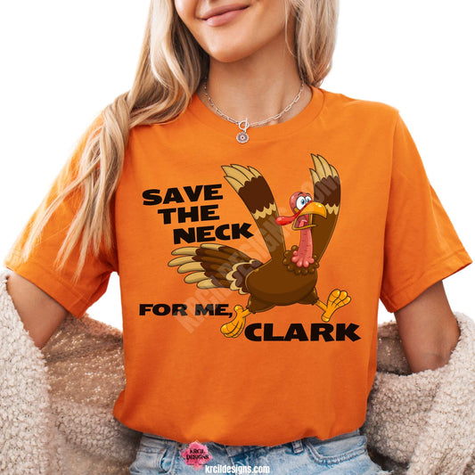 Funny Thanksgiving Shirts by KrcilDesigns.com | Graphic design on a orange t-shirt, featuring a cartoon turkey running with a panicked expression, wings flapping, and text that reads: "Save The Neck For Me, Clark" in bold black letters.