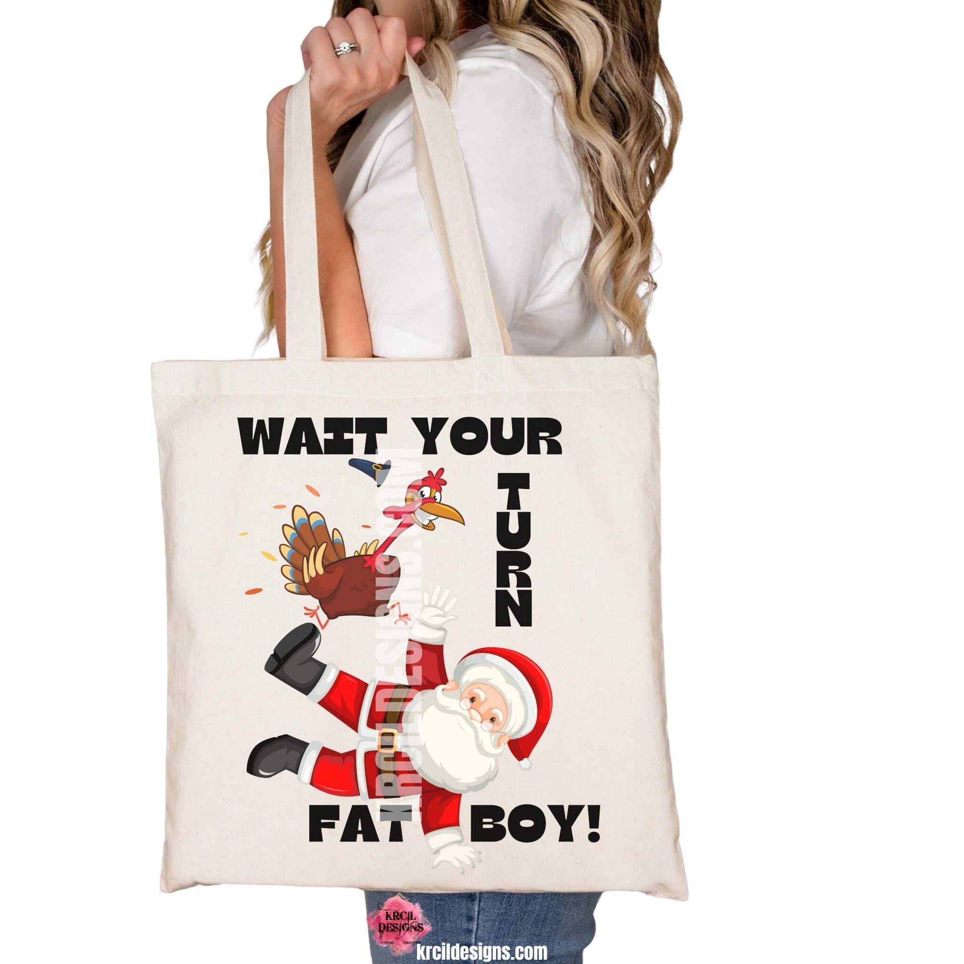 Thanksgiving Funny Tote Bags by KrcilDesigns.com | Graphic design on a canvas tote bag, featuring a cartoon Thanksgiving turkey wearing a pilgrim hat, stomping on Santa Claus, with playful motions and feathers flying. Bold black text in all caps, surrounds the scene, that reads: "WAIT YOUR TURN FAT BOY!" Fun holiday shirts that blend Thanksgiving and Christmas humor.