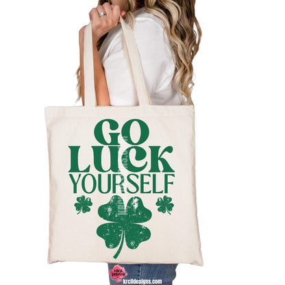 Go Luck Yourself! Shamrock St. Patrick's Day Funny Tote Bags by Krcil Designs | Make a fashion statement with our tote bags! Meet our shopper bags—your new sidekick! You know, the ones that always tag along and never lets you down—it's about to become your favorite fashion accessory! Perfect for grocery shopping or errands. Introducing our sassy tote bag made just for St. Patty's Day! Our graphics showcases the words "GO LUCK YOURSELF" in bold green letters, accented with shamrocks.