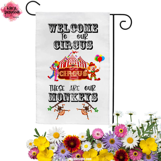 Welcome to Our Circus These Are Our Monkeys Garden Flag by Krcil Designs | Make your garden the talk of the town with our custom garden flag! Ladies and gentlemen, boys and girls, welcome to the greatest show on Earth! Where the family takes center stage. Meet the headlining clowns, Mom and Dad, and the monkeys aka the kids! Featuring a circus tent and as many monkeys as kids. Add everyone's name and let the circus begin—on this personalized garden flag! Shop Garden Flags at KrcilDesigns.com