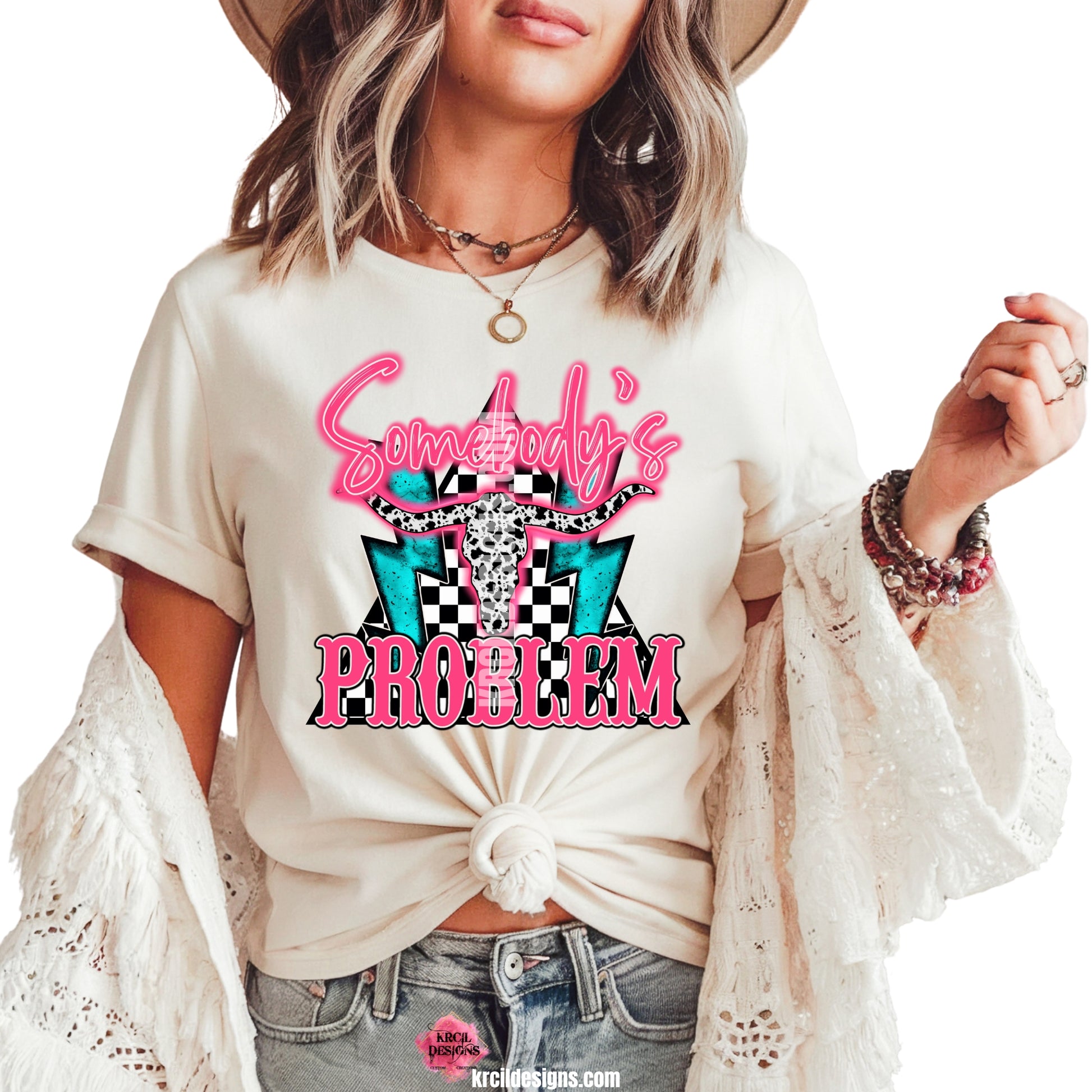 Sassy Graphic Tees T-Shirts by KrcilDesigns.com | Graphic design on a white t-shirt, featuring hot pink text that reads: "Somebody's PROBLEM" with "Somebody's" as a handwritten font at top and "PROBLEM" in all caps block-letter font at bottom, with cowhide bullhorns at its center, black and white checkered triangle background, and turquoise lighting bolts.