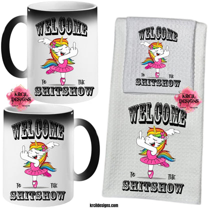 "WELCOME to the SHITSHOW" Ballerina Unicorn Sets and Bundles by Krcil Designs | Meet our whimsical Ballerina Unicorn, with a golden horn, a pink tutu, pink ballet shoes, rainbow-hued mane, playfully raises a hoof, and a middle finger that speaks volumes in its own magical language. Spice up your kitchen with our waffle weave dish cloth tea towel set, perfectly paired with our custom personalized coffee cups and mugs. For the ultimate coffee lovers gift, explore our sets and bundles. KrcilDesigns.com