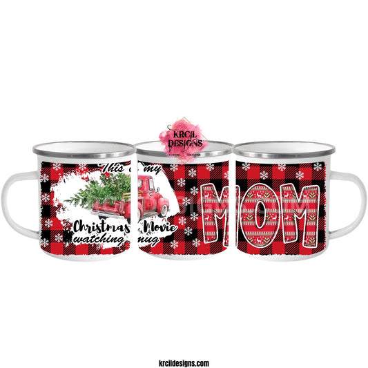 "This is my Christmas Movie Watching Mug" Personalized Metal Enamel Mug Christmas Coffee Cup by Krcil Designs | Imagine your kitchen transformed into a winter wonderland, complete with the iconic Christmas Red Truck, hauling a Christmas tree, its bed adorned with rustic wood railings. But that's not all – we're about to sprinkle a touch of personalization magic into your holiday season! Accessorize your kitchen with our sets and bundles and add personalization with your last name! KrcilDesigns.com