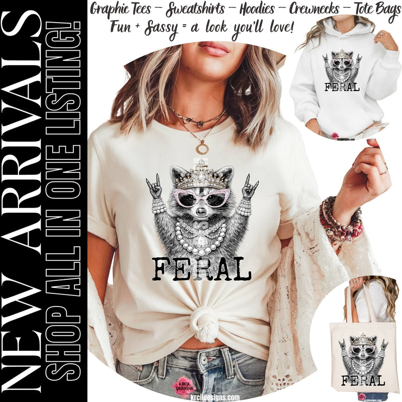 New Arrivals:  Funny Graphic Tees, Sweatshirts, Hoodies and Crewneck Sweaters, Tote Bags, Showcasing a Glamorous Raccoon with a Funny Quote "FERAL" – Krcil Designs Boutique Apparel, Gillette, WY
