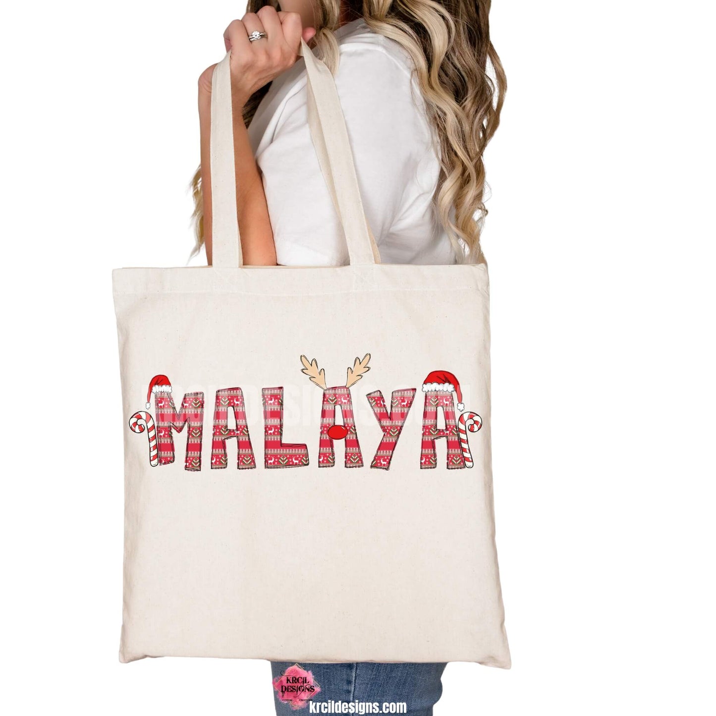 Christmas Personalized Tote Bags by KrcilDesigns.com | Graphic Design on a canvas tote bag, features your name, in name style option: "Ugly Sweater" where all letters are the same festive design in an ugly sweater pattern. The letters, one adorned with Rudolph's Red Nose, Reindeer Antlers, plus, Santa Hats and Candy Canes on each side of your name.