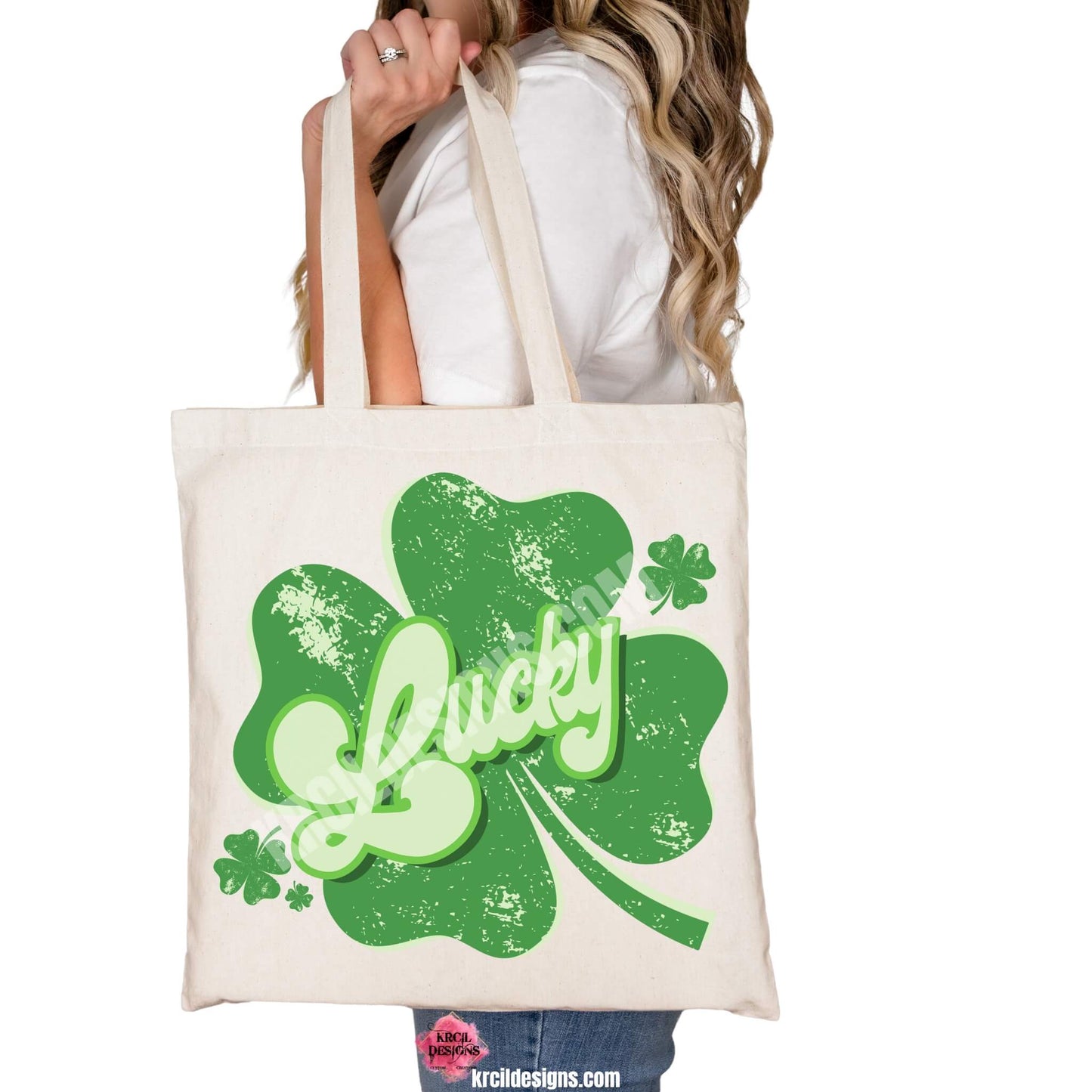 Lucky Shamrock St. Patrick's Day Retro Tote Bags by Krcil Designs | Make a fashion statement with our tote bags! Meet our shopper bags—your new sidekick! You know, the ones that always tag along and never lets you down—it's about to become your favorite fashion accessory! Perfect for grocery shopping or errands. Our graphics showcases the word Lucky in retro style green letters, outlined in two shades of green, placed on top of a shamrock, floating shamrocks on the sides. Shop Tote Bags at KrcilDesigns.com