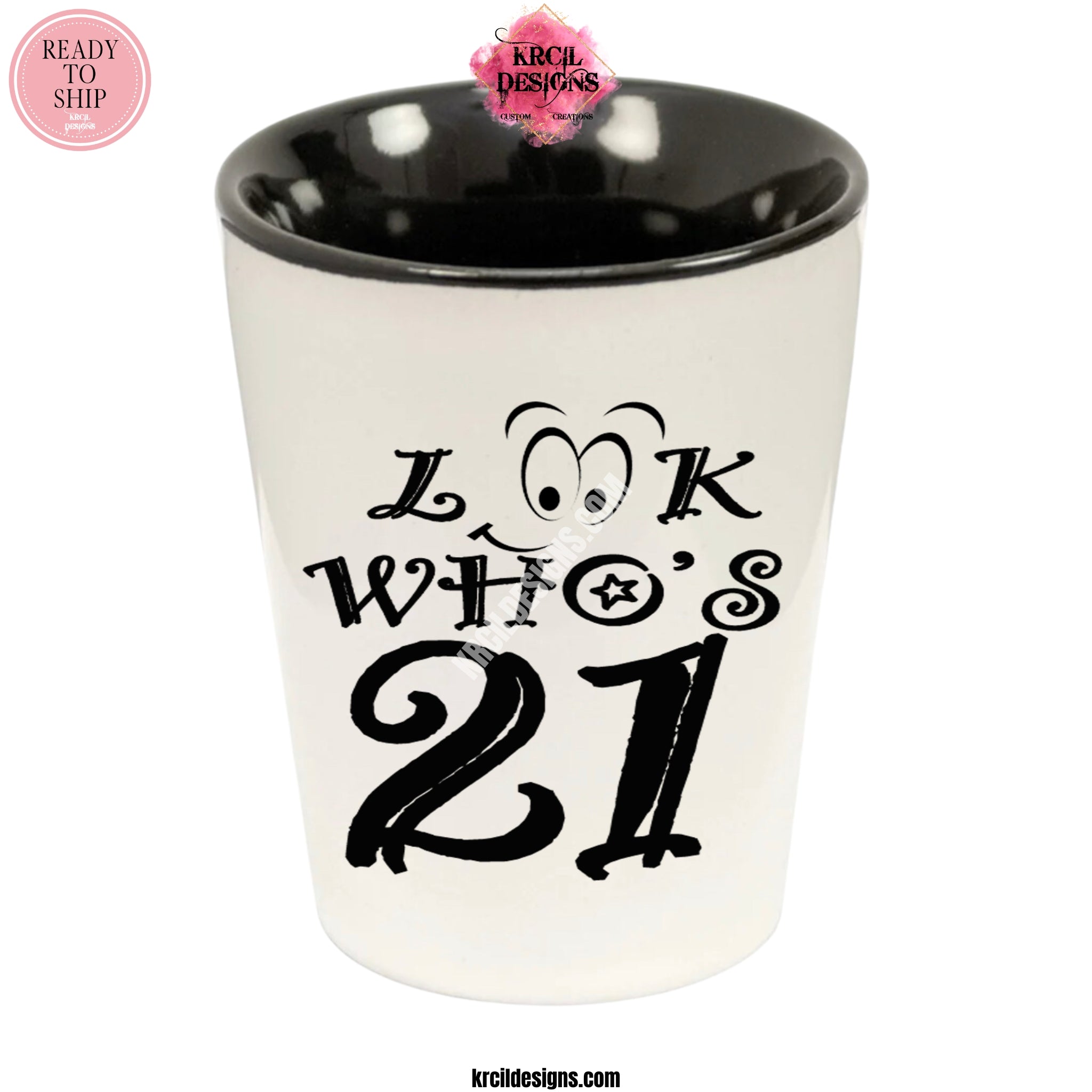 "Look Who's 21" Shot Glass by Krcil Designs | Get ready to toast to the good times with our custom personalized shot glasses, perfect for the man cave. Pair them with your favorite bottle of liquor and put them in a basket for the ultimate gift. Don't forget to add the matching dish cloth tea towel set! Explore our sets and bundles options for gift ideas. Perfect for birthdays and holidays. Two toned, black interior, white exterior, ceramic shot glass. KrcilDesigns.com