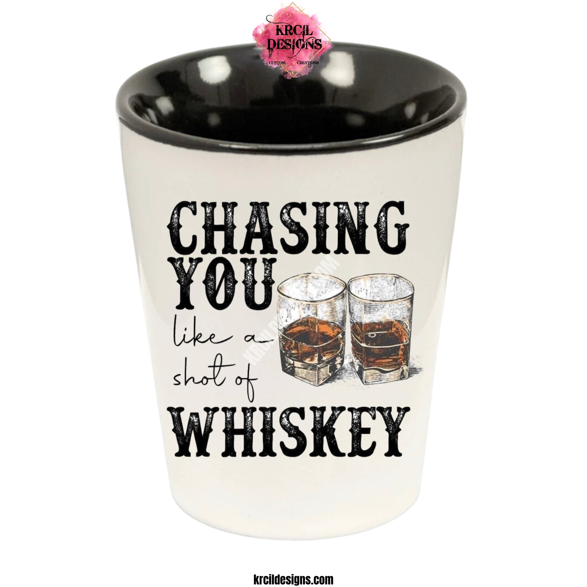 "Chasing You Like a Shot of Whiskey" Shot Glass by Krcil Designs | Get ready to toast to the good times with our custom personalized shot glasses, perfect for the man cave. Pair them with your favorite bottle of liquor and put them in a basket for the ultimate gift. Don't forget to add the matching dish cloth tea towel set! Explore our sets and bundles options for gift ideas. Perfect for birthdays and holidays. Two toned, black interior, white exterior, ceramic shot glass. KrcilDesigns.com