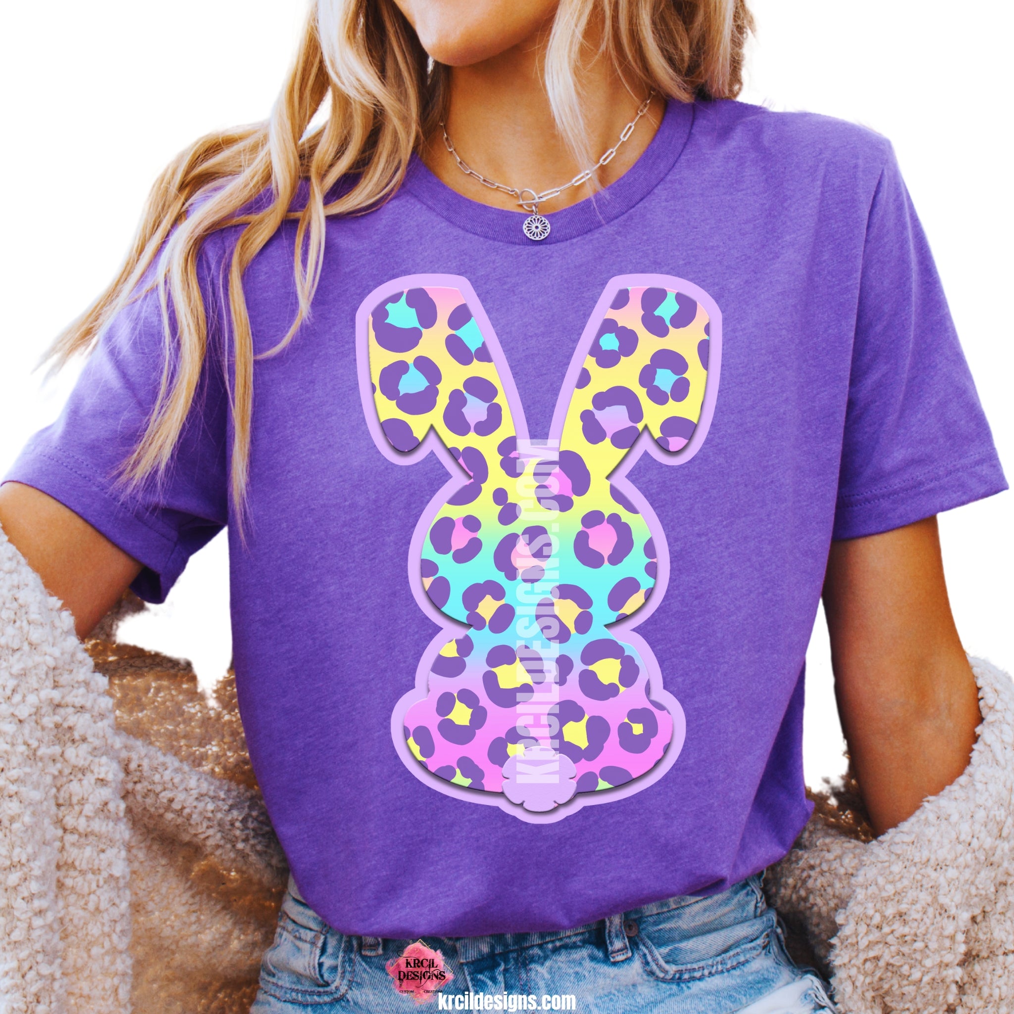 Pastel Cheetah Print Easter Bunny T-Shirt by Krcil Designs | Make a fashion statement with our graphic tees t-shirts! Our buttery soft cozy tees will become your new weekend bestie! Get ready to hop into fun with our fun Easter shirt! Our graphic design, showcases a pastel cheetah print bunny and vibrant splashes of Easter colors. This Easter, celebrate in style with matching family shirts—perfect for family photos! Shop Easter Shirts at KrcilDesigns.com