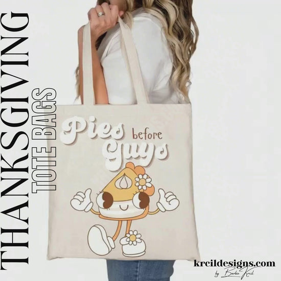 Thanksgiving Funny Tote Bags by KrcilDesigns.com | Graphic design on a canvas tote bag, featuring a playful cartoon piece of pumpkin pie retro character with arms, legs, and daisy flowers, striking a sassy pose with both hands making the 'thumbs up' sign. Surrounded by retro-style white text that reads: "Pies before Guys"