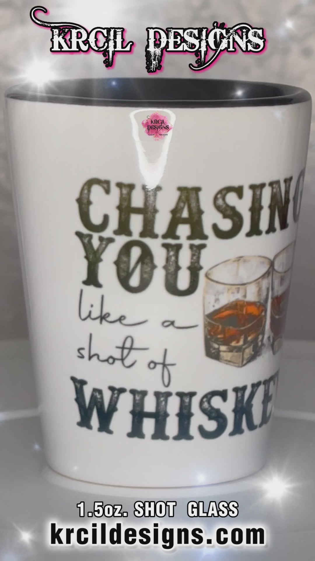 "Chasing You Like a Shot of Whiskey" Shot Glass by Krcil Designs | Get ready to toast to the good times with our custom personalized shot glasses, perfect for the man cave. Pair them with your favorite bottle of liquor and put them in a basket for the ultimate gift. Don't forget to add the matching dish cloth tea towel set! Explore our sets and bundles options for gift ideas. Perfect for birthdays and holidays. Two toned, black interior, white exterior, ceramic shot glass. KrcilDesigns.com