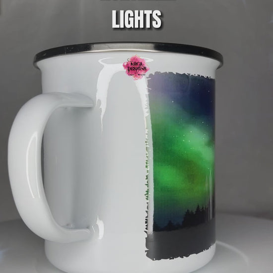 Northern Lights Camp Mug Personalized Metal Enamel Mug by Krcil Designs | Let our custom coffee cups do the talking with our collection of personalized coffee cups. Personalize It - add name, monogram, make a one-of-a-kind picture collage photo cup - the picture-perfect present! Add our dish cloth and tea towel set, perfectly paired with our cups and mugs. For the ultimate coffee lovers gift, explore our sets and bundles. KrcilDesigns.com