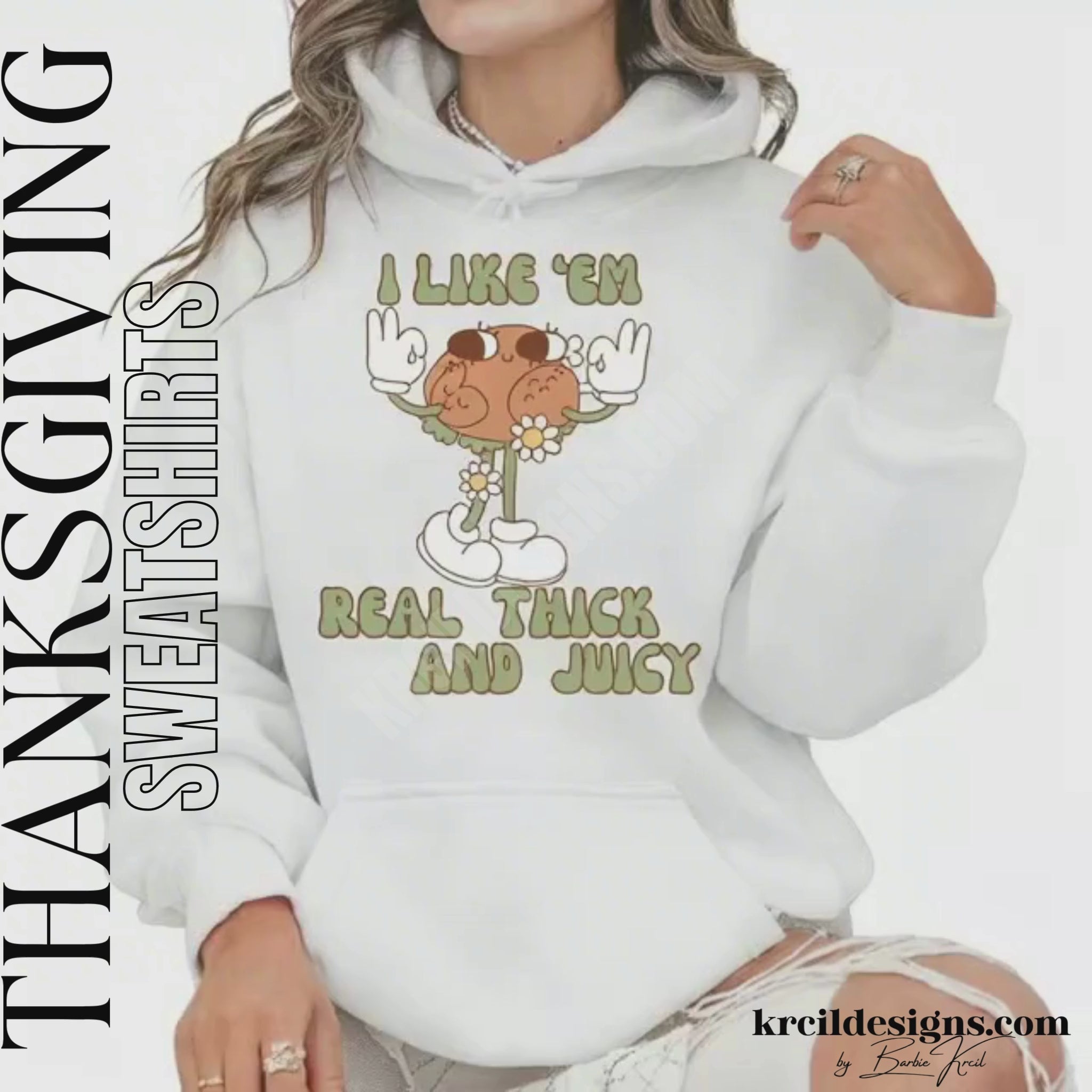 Funny Thanksgiving Shirts by KrcilDesigns.com | Graphic design on a white hoodie, featuring a playful cartoon turkey leg retro character with arms, legs, sunglasses, and daisy flowers, striking a sassy pose with both hands making the 'okay' sign. Surrounded by retro-style sage green text in all caps that reads: "I LIKE ‘EM REAL THICK AND JUICY"