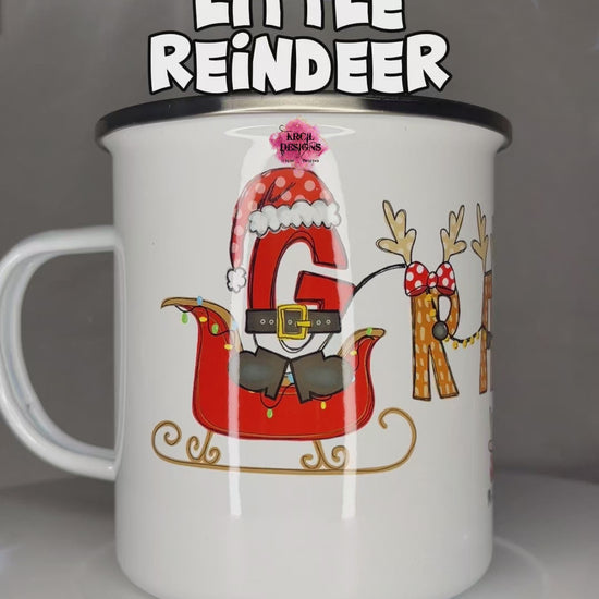 Christmas Personalized Coffee Mugs by KrcilDesigns.com | A video of a camp mug, in name style option: "Grandma's Little Reindeer" stars a "G" that's gone full Santa mode, dressed up in Santa's Suit and Santa's Hat, riding in Santa's sleigh with twinkling Christmas lights, while the rest of the "Grandma" letters are transformed into Santa's Reindeer. Featuring reindeer antlers, bows, and Rudolph's Red Nose — yup, he's leading the parade! Not just for Grandma, we have them for everyone!