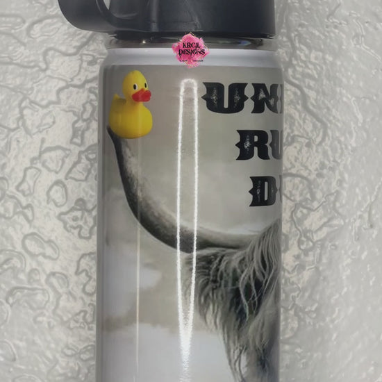 Unlucky Rubber Ducky Highland Cow Water Bottle by Krcil Designs | This custom water bottle features a highland cow, with a fluffy coat, its massive horns, and a rubber duck on each horn; you'll be laughing until the cows come home! Especially with the funny quote, "Unlucky Rubber Ducky"! This hydro water bottle is the ultimate in Highland Cow Gifts! Add a personal touch, add name, your favorite highland cow quote, for a one-of-a-kind personalized water bottle. Shop Highland Cow Gifts at KrcilDesigns.com