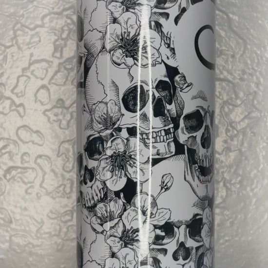 Rock-On Skulls Personalized Tumbler by Krcil Designs | Featuring a black/white skull pattern, a skeleton hand with the rock-on sign. | Let our custom tumblers do the talking with our collection of personalized tumblers. Personalize It - add name, monogram, picture collage photo tumbler - the picture-perfect present! For the ultimate gift, add a t-shirt, or accessorize with a custom tote bag. Insulated stainless steel tumblers include a plastic slide top lid and metal or plastic straw. KrcilDesigns.com