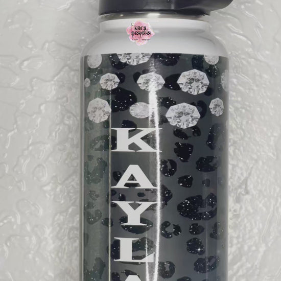 Diamonds Are A Girl's Best Friend -Marilyn Monroe Water Bottle by Krcil Designs | Shine Bright Like A Diamond with our Marilyn Monroe Water Bottle—made for Marilyn Monroe Lovers! This hydro water bottle has the Diamonds Quote. This custom water bottle has a black cheetah print backdrop, wrapped in diamonds, features Marilyn and her signature lips! Add a personal touch, add name, your favorite Marilyn Monroe quote, for a one-of-a-kind personalized water bottle. Shop Marilyn Monroe Gifts at KrcilDesigns.com